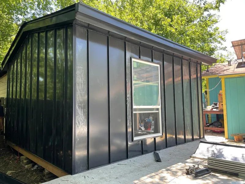 Black standing seam metal wall panels for Metal Roof Installation in Treasure Island